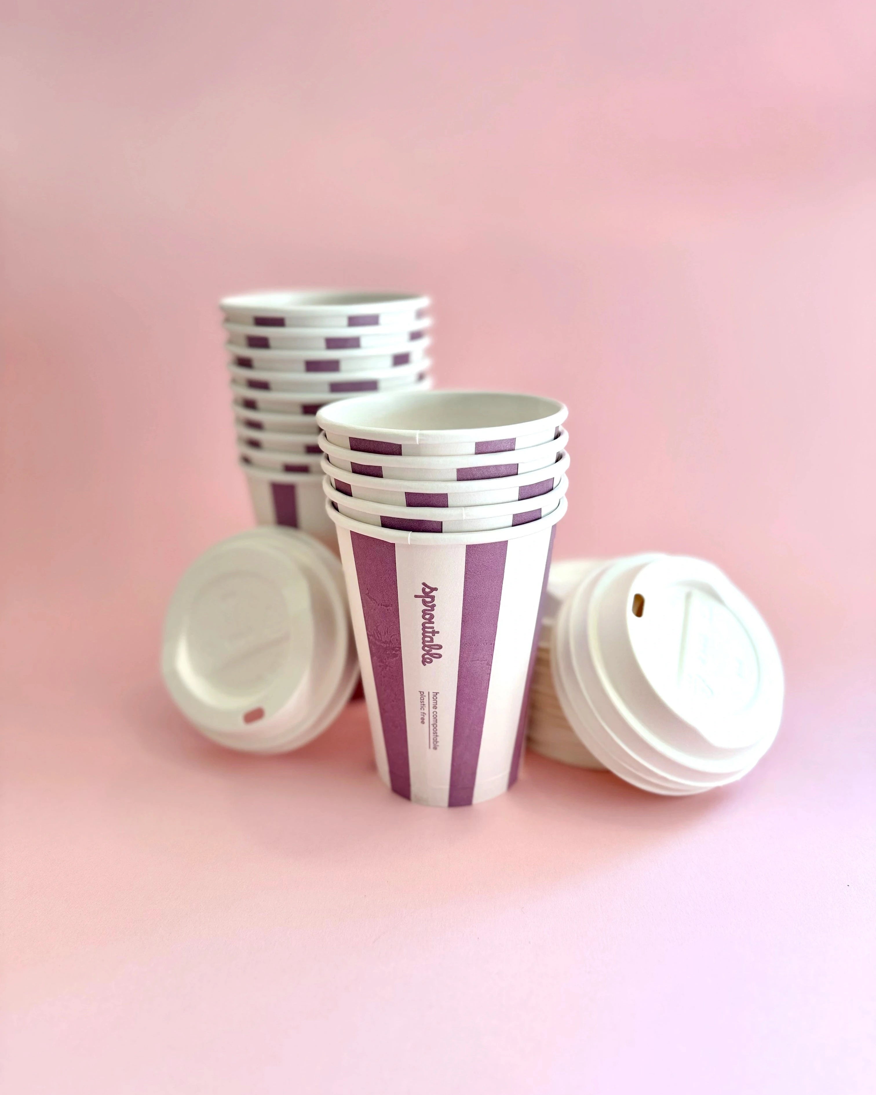 Stack of 14 Sproutable mauve striped 12oz home compostable cups and compostable lid – plant fiber, home compostable, plastic-free