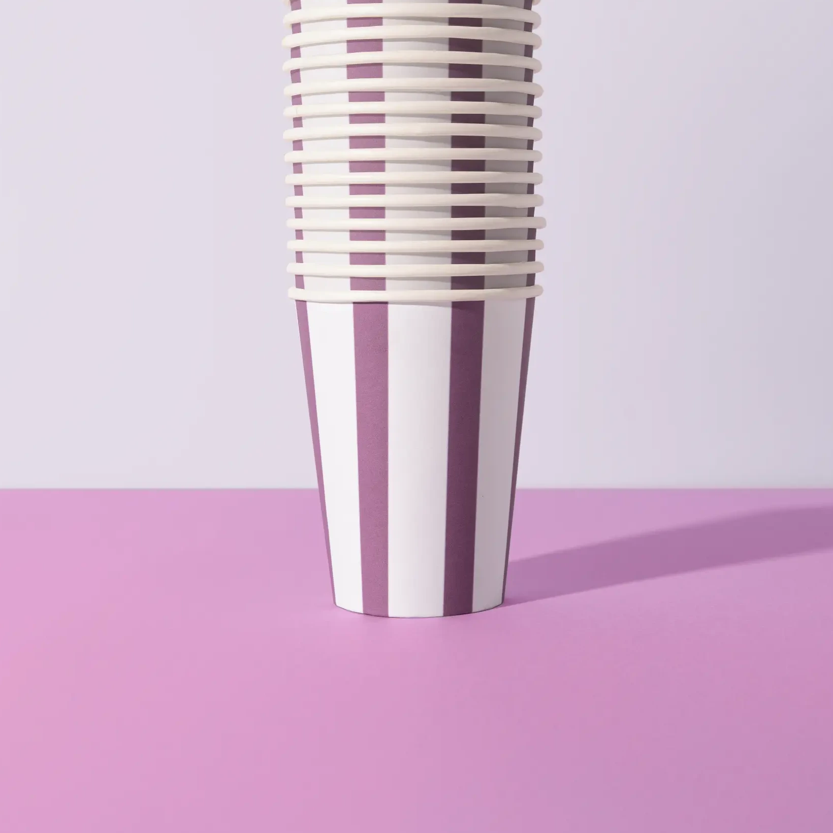 Stack of Sproutable mauve striped 12oz home compostable cups – plant fiber, home compostable, plastic-free