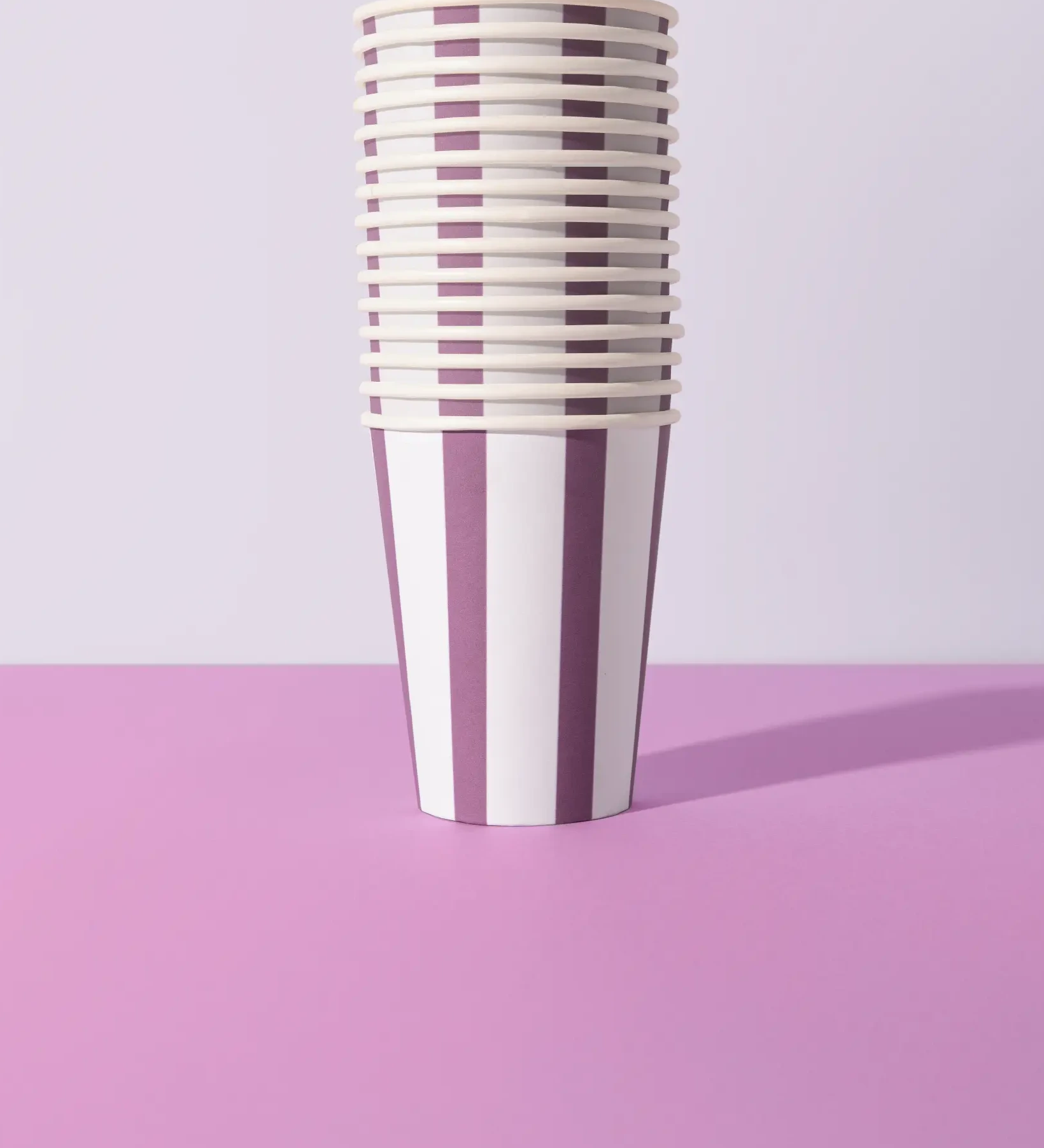 Stack of Sproutable mauve striped 12oz home compostable cups – plant fiber, home compostable, plastic-free