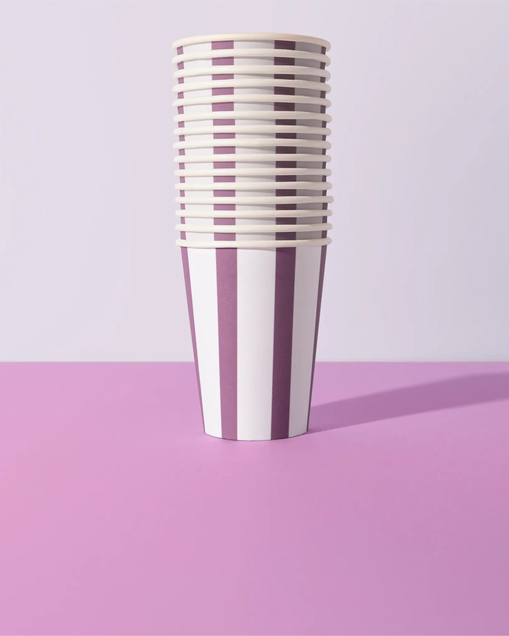 Stack of Sproutable mauve striped 12oz home compostable cups – plant fiber, home compostable, plastic-free
